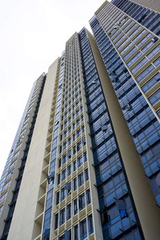 Huge resident apartment building with blue glass