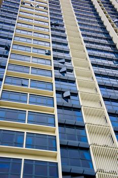 Huge resident apartment building with blue glass