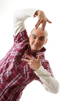 Young man framing his face over white background
