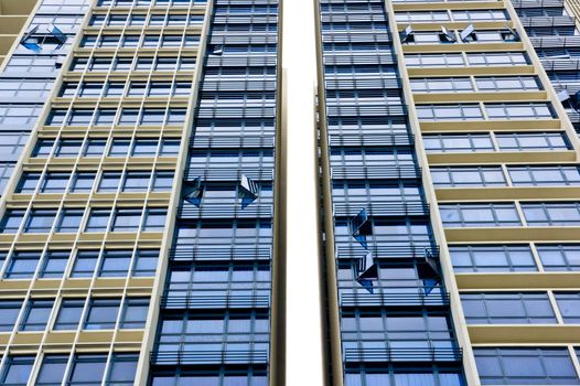 Huge resident apartment building with blue glass