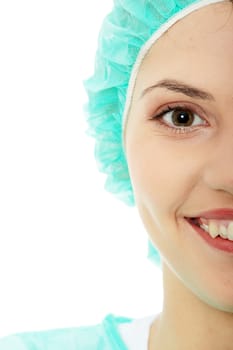 Portrait of female surgeon or nurse wearing protective uniform, isolated on white background