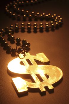 stock image golden dollar sign with chain