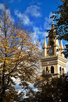 Bell tower with autumnal trees