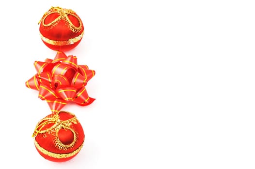 Christmas ornaments in a row isolated on white