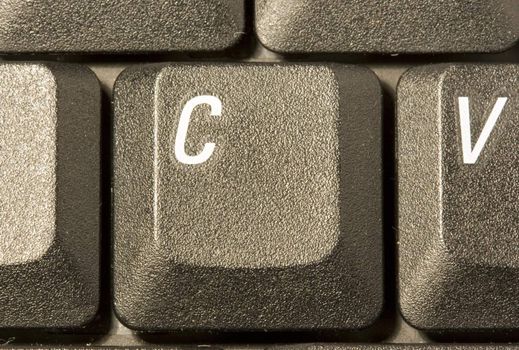 computer key in a keyboard with letter, number and symbols