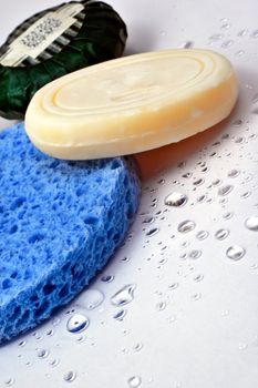 Soap and blu sponge with droplets