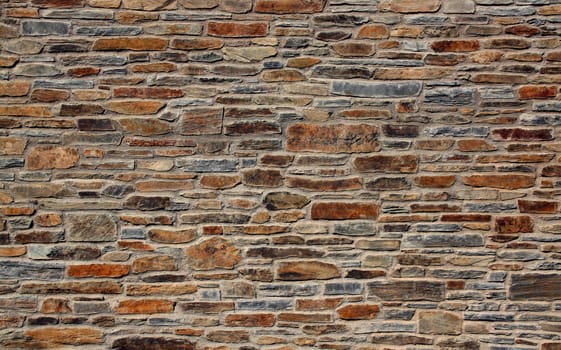 stone wall of a mediterranean town, background texture