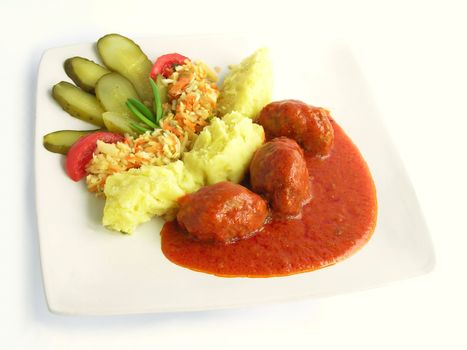 beef collops with tomato sauce and vegetable