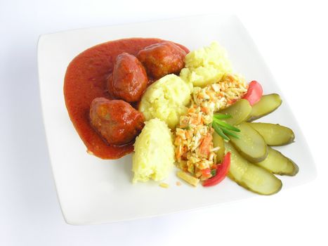 beef collops with tomato sauce and vegetable