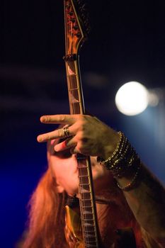 Guitarist on a stage in music club