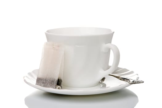 White tea cup and a tea bag