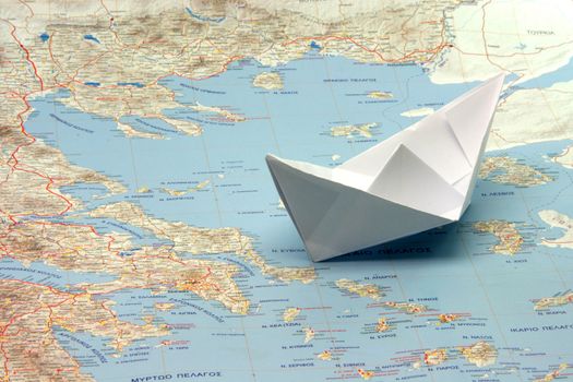 travel to greek islands by boat boat figure on a map of greece