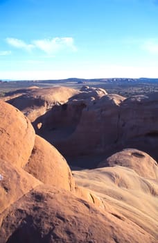 Arches National Park preserves over 2,000 natural sandstone arches, including the world-famous Delicate Arch, in addition to a variety of unique geological resources and formations.