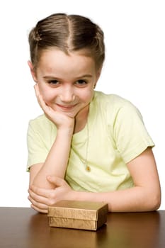 Nice girl on a table, white background