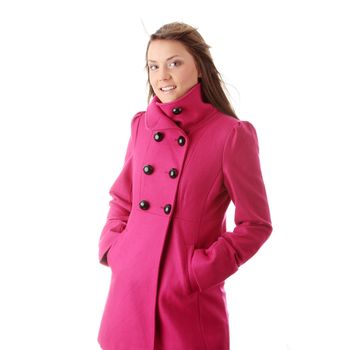 Teen woman in pink female coat isolated on white background