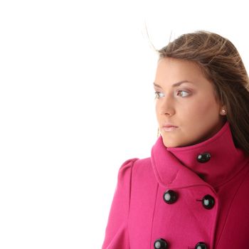 Teen woman in pink female coat isolated on white background
