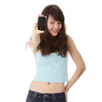 Teen caucasian woman using a mobile phone isolated on white background
