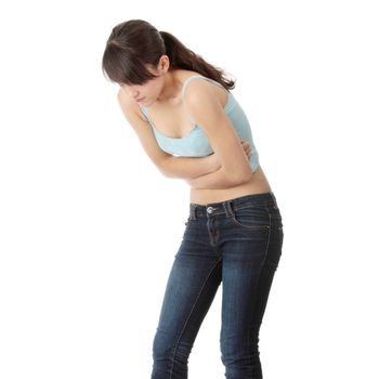 Young teen woman with stomach ache isolated on white background