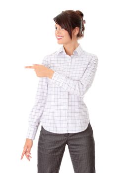 Young happy businesswoman pointing direction, isolated on white