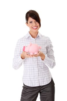 Businesswoman holding piggy bank. Isolated on white background
