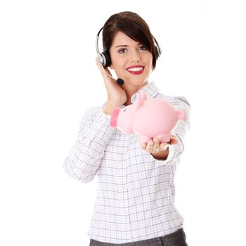 Young business woman with headset holding piggy bank