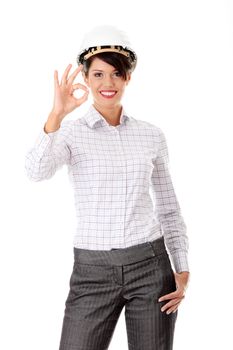 Portrait of confident female worker in helmet