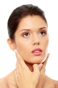 Beautiful woman's face with fresh clean skin isolated on white