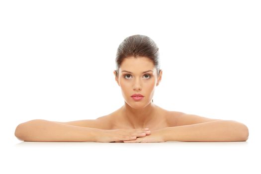 Portrait of the attractive girl without a make-up, isolated on white background