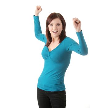 Young angry woman with fist up, over white background