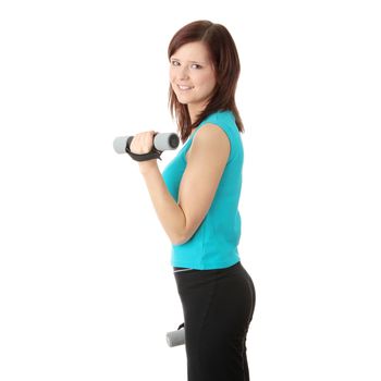 Portrait of beautiful smiling girl with dumbbells.