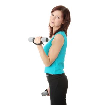 Portrait of beautiful smiling girl with dumbbells.