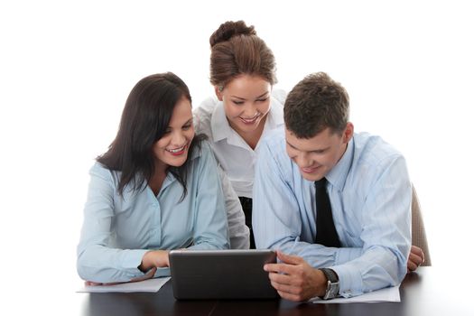 Interracial business team working at laptop in a office, isolated on white