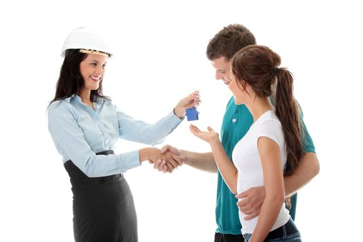 Real estate agent and young couple isolated on white background