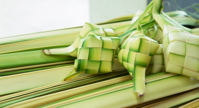 Ketupat: South East Asian rice cakes bundle, often prepared for festivities and celebratory occasions.                      