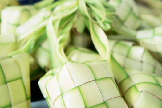 Ketupat: South East Asian rice cakes bundle, often prepared for festivities and celebratory occasions.                   