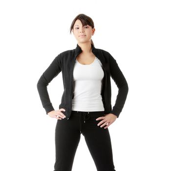 Physical training (aerobics) of beautiful young woman isolated on white background