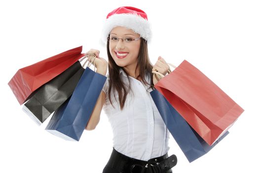 Shopping Christmas woman smiling. Isolated over white background