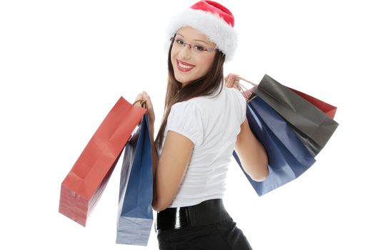 Shopping Christmas woman smiling. Isolated over white background