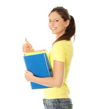 Happy student girl with thumb up, isolated on white