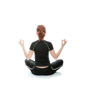 Beautiful young woman doing yoga exercise , isolated
