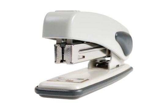 Office stapler closeup. Isolated on white background.