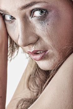 Emotional portrait of abused, crying, beautiful, young ,caucasian woman in underwear - violence concept, high emotional - hdr