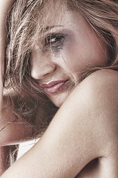 Emotional portrait of abused, crying, beautiful, young ,caucasian woman in underwear - violence concept, high emotional - hdr