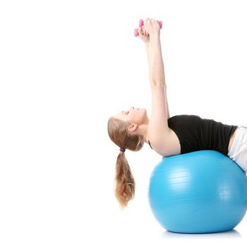 Young blond woman exercising, isolated on white background