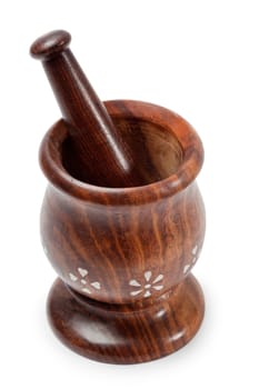 Wooden mortar and pestle isolated white background