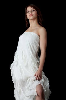 A young beautiful woman in white dress
