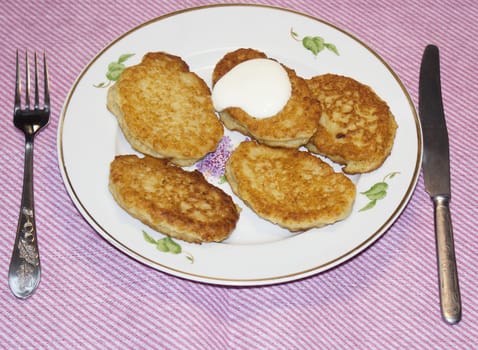 Appetizing baked fritters will add a variety in your menu of the day off
