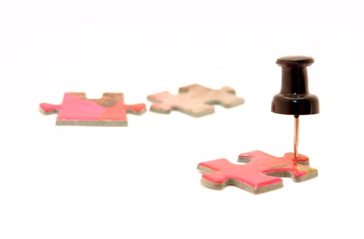 Buttons and puzzle on a white background