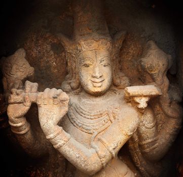 Krishna bas relief in Hindu temple. Sri Ranganathaswamy Temple. Tiruchirappalli (Trichy), Tamil Nadu, India