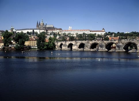 View of river Vltava and Prague Castle with Charles Bridge in Prague, Czech Republic
